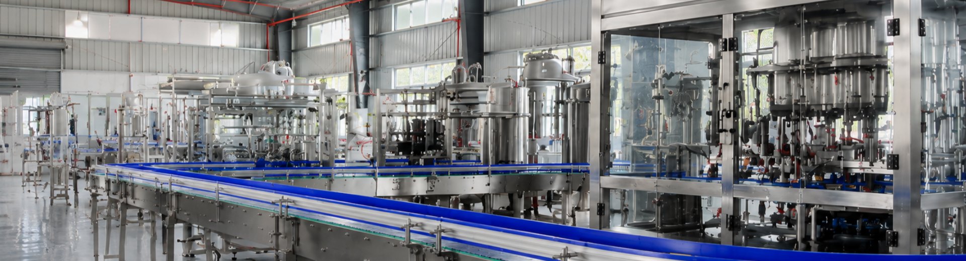 Thiết kế vùng đệm giữa máy chiết rót và máy đóng gói: 5 bước kiểm tra để tránh tắc nghẽn trong dây chuyền nước đóng bình